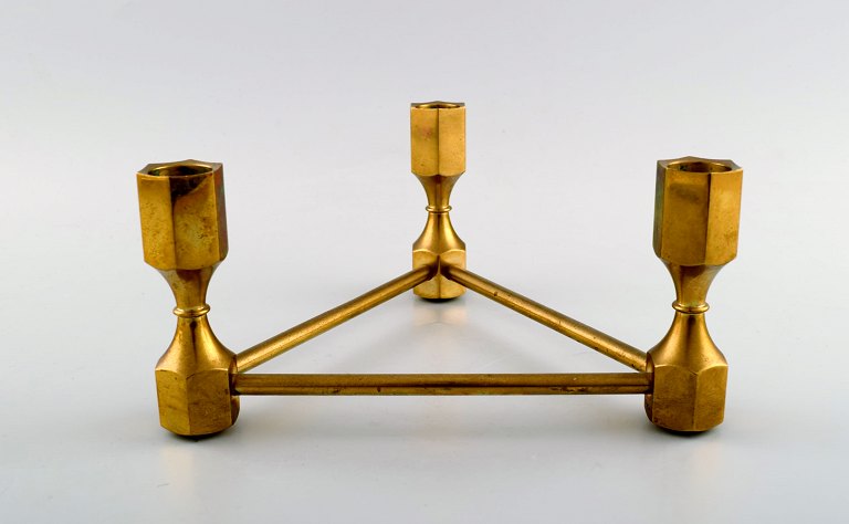 Gusum metal candle holder in brass for three light.