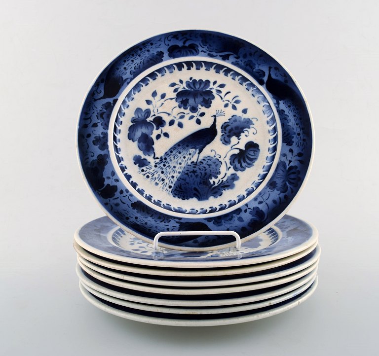 Peacock from Copenhagen faience / Aluminia.Flat plate in earthenware. 8 pieces in stock.