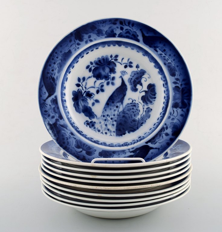 Peacock from Copenhagen faience / Aluminia.Deep plate in faience. 10 pieces in stock.