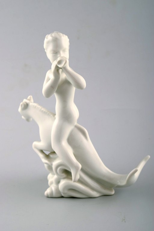 Harald Salomon for Rörstrand, blanc de chine / white glazed figure of a fawn riding on fabel creature.