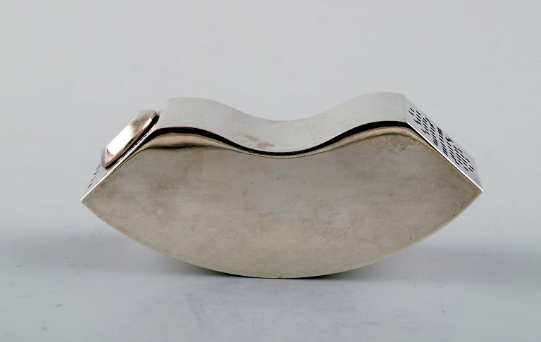 Josefine Davidsson, Swedish silversmith, workshop in Stockholm.Modernist saltshaker of sterling silver. 2000s.