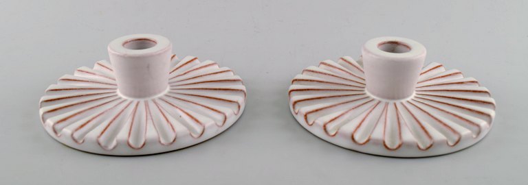 Schollert, Denmark, a pair of low candlesticks in ribbed style, classic art deco form.