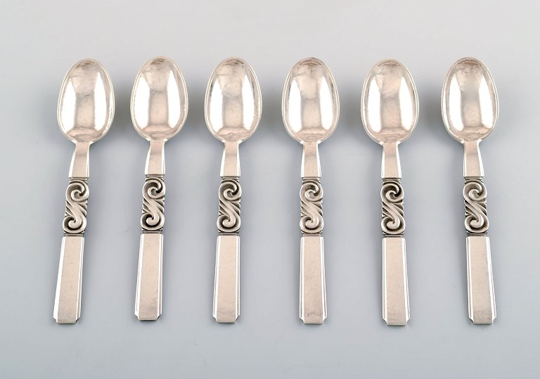 Georg Jensen. Cutlery, Scroll no. 22, hammered Sterling Silver consisting of: 6 coffee spoons.