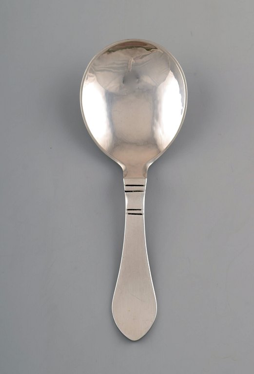 Georg Jensen. Continental (Antik) jam spoon, hand hammered.