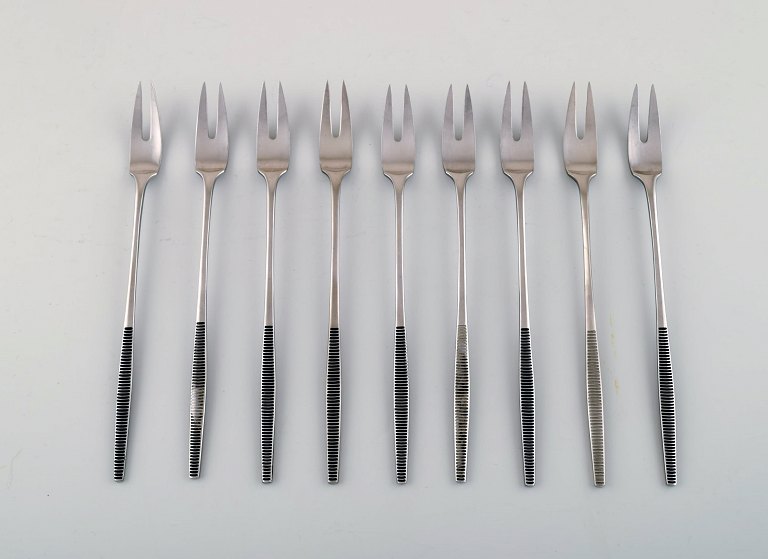 Set of nine herring forks/serving forks, Jens H. Quistgaard "Variation VI" cutlery of handmade stainless steel.