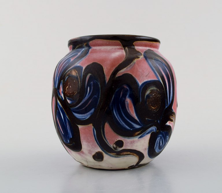 Kähler, Denmark, glazed stoneware vase. 1940 s. Blue flowers on pink base.