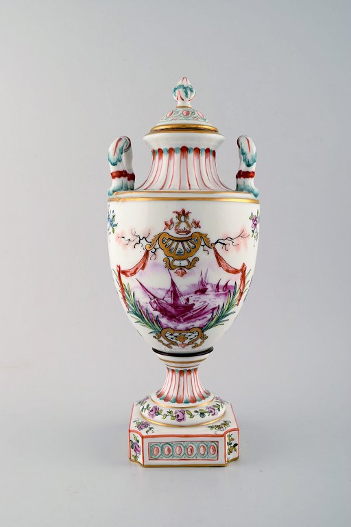 Antique lidded vase of porcelain in overglaze. Classic style. late 1800s.