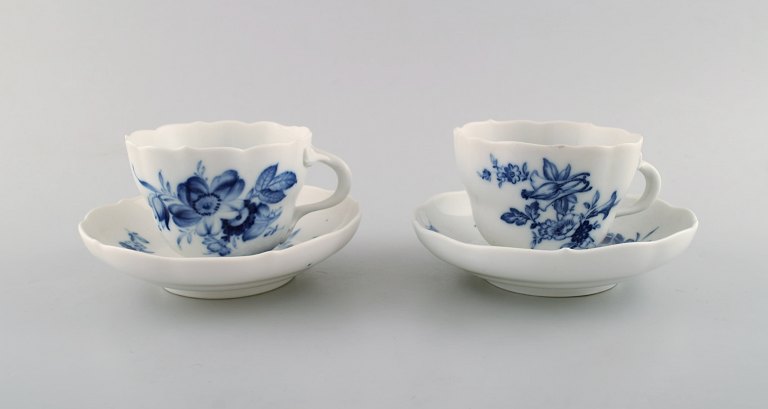 A pair of Meissen blue onion coffee cups and saucers.