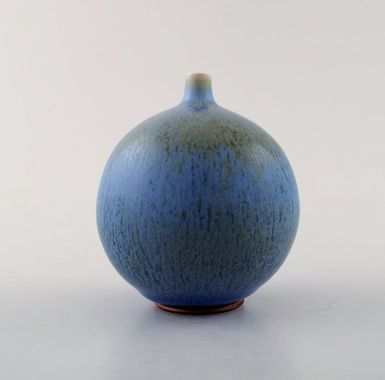 Tomas Anagrius (b.1939), Swedish ceramist. Unique ceramic vase in beautiful blue glaze. Rare spherical shape with narrow neck.