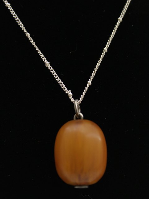 Sterling silver necklace with amber pendant