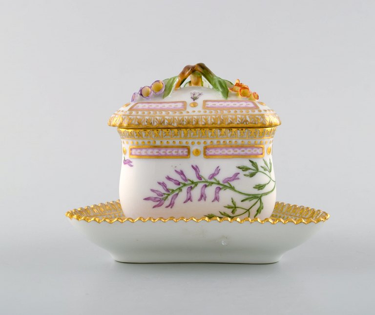 Royal Copenhagen Flora Danica triangular cream cup. Dessin # 20/3575 with branch shaped handle and flowers.
