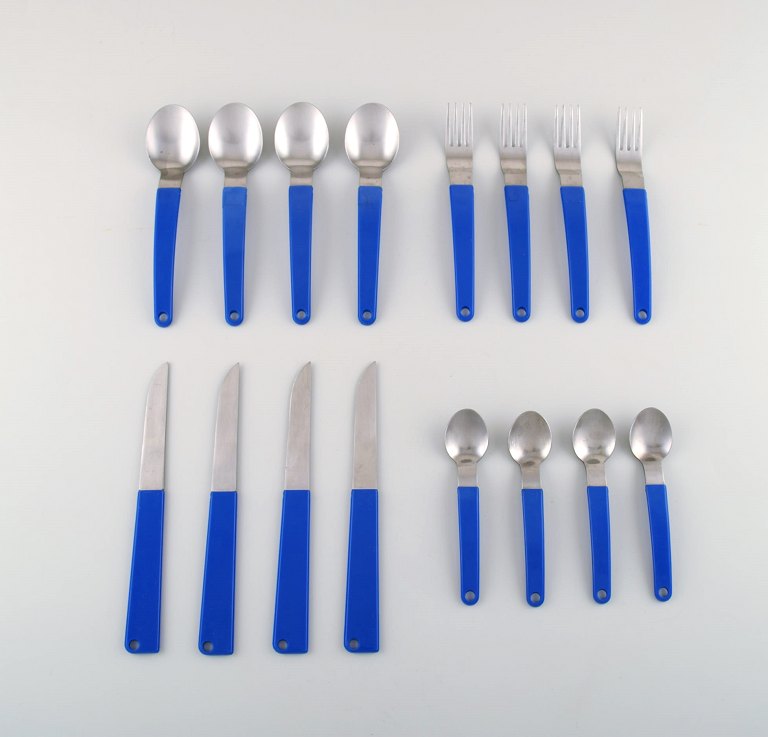 Gense, Sweden. Holiday dinner service, cutlery for four people in stainless steel and dark blue melamine plastic. 1960