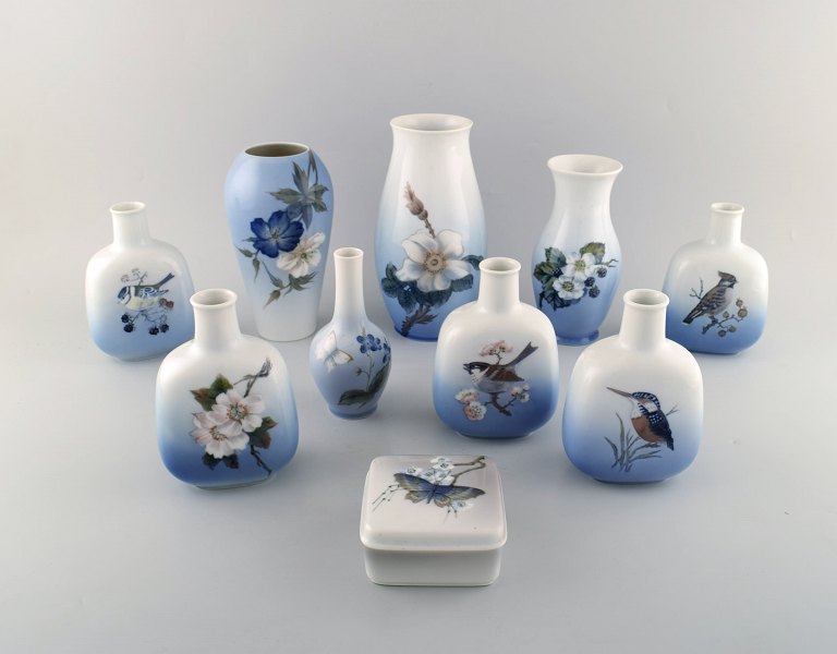 Royal Copenhagen and B&G / Bing & Grondahl. Collection of 10 vases and lidded jar with flowers and bird motifs.