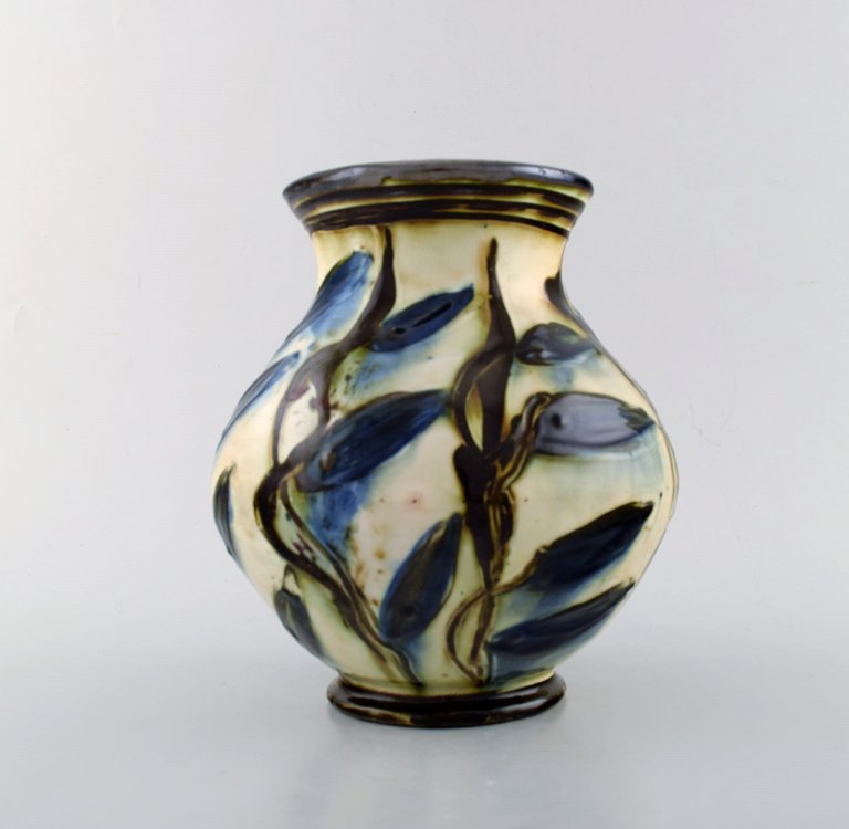 Kähler, HAK, glazed stoneware vase in modern design. 1930 / 40s. Blue flowers on cream colored background.