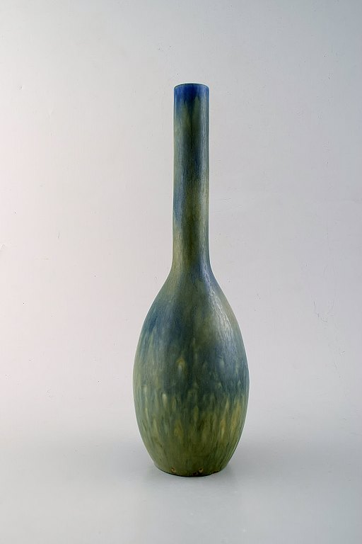 Carl-Harry Stålhane for Rørstrand. Large ceramic vase with narrow neck. Beautiful glaze in blue / green shades. 1960