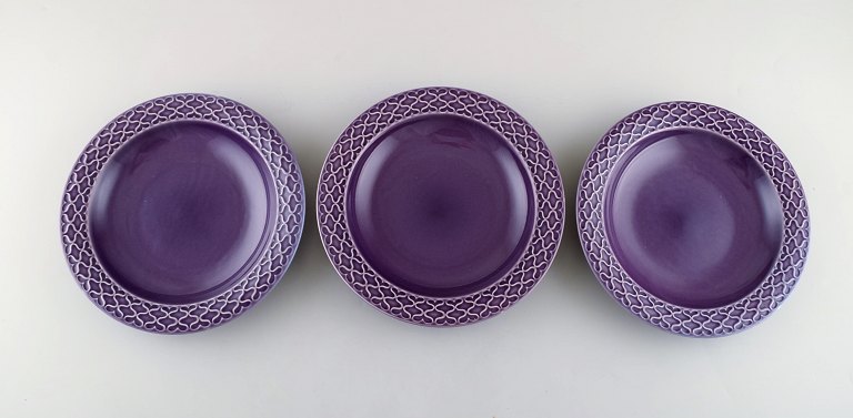 Jens H. Quistgaard for Bing & Grondahl. Three purple "Cordial Palet" soup / pasta plates in glazed stoneware. 1960