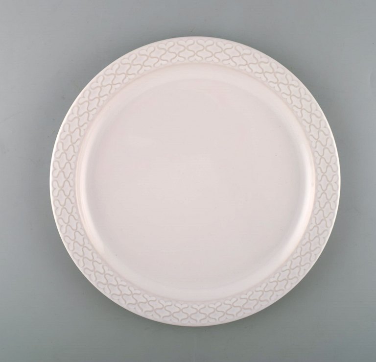 Jens H. Quistgaard for Bing & Grondahl. Large white "Cordial Palet" serving dish in glazed stoneware. 1960