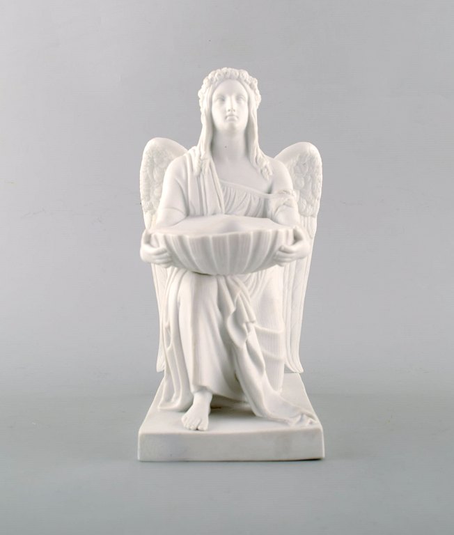 Antique Royal Copenhagen figurine in biscuit. The angel of baptism after Thorvaldsen. 1860-1880.