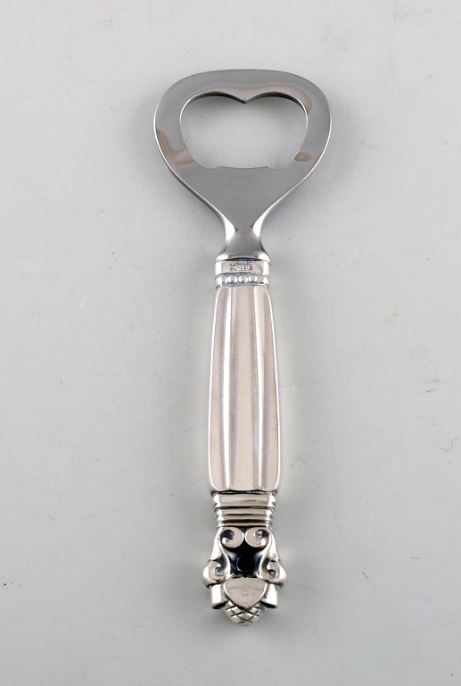 Georg Jensen "Acorn" bottle opener in sterling silver and stainless steel.Designer: Johan Rohde.
