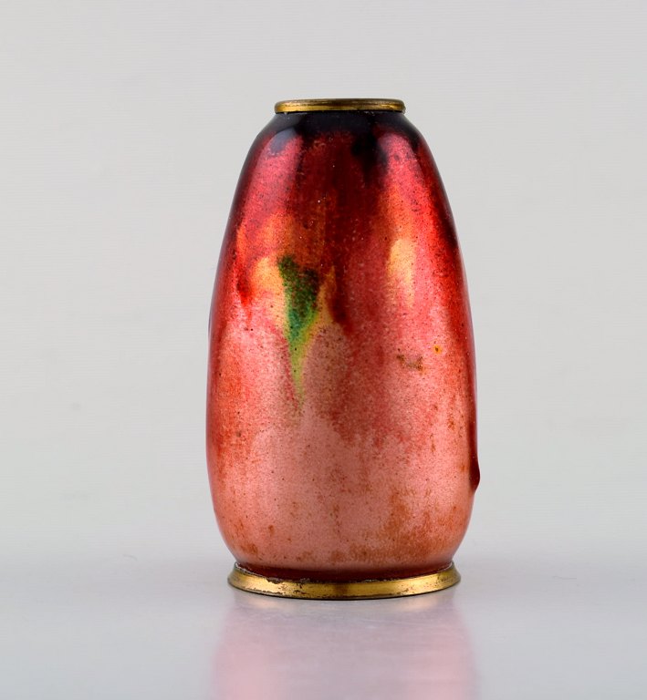 Alexandre Marty for Limoges, France. Art nouveau bronze vase. Beautiful enamel work in red shades. Ca. 1910.