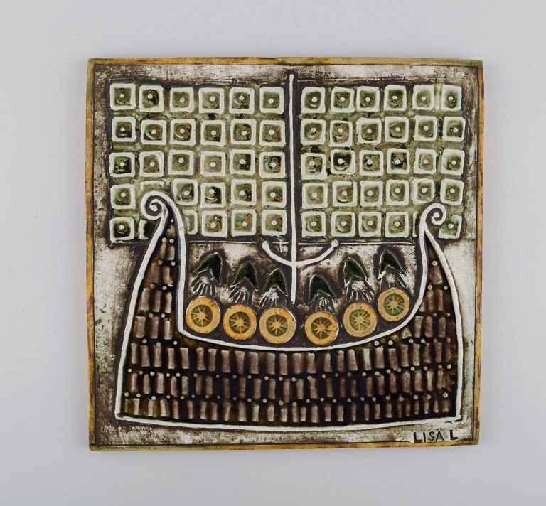 Lisa Larson for Gustavsberg. Glazed ceramic wall plaque decorated with Vikings. 1970