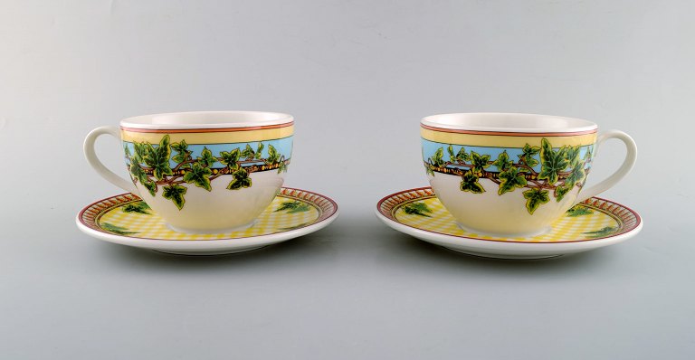 Gianni Versace for Rosenthal. Two "Ivy Leaves Passion" cups with saucers. Late 20th century.