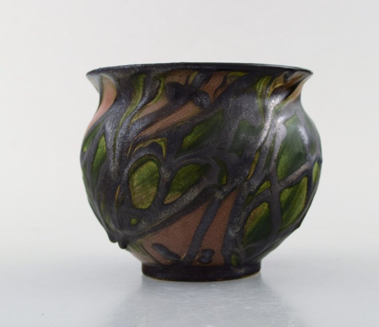 Kähler, HAK, glazed stoneware vase in modern design. 1930 / 40s. Leaves and branches on brown background.