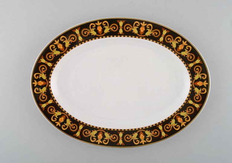 Gianni Versace for Rosenthal. Oval "Barocco" porcelain dish / tray with gold decoration. 20th century.