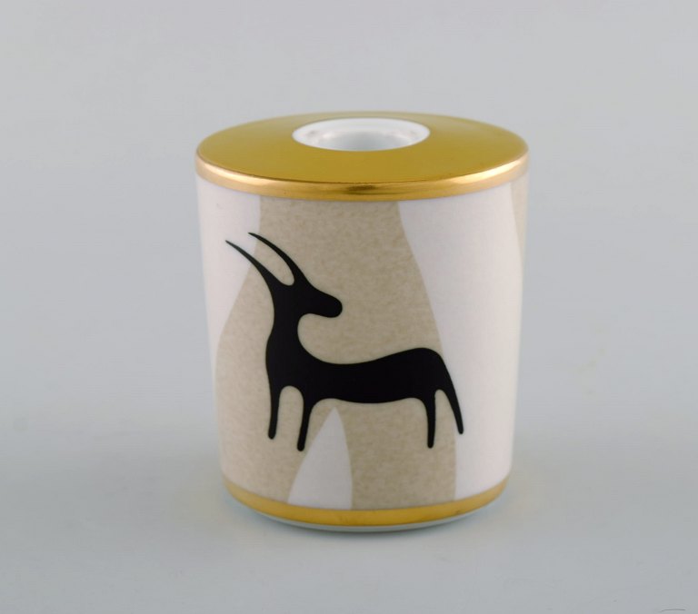 Bvlgari / Bulgari for Rosenthal. "Pascolo Rupestre" candle holder in porcelain. Animal motif and gold decoration. Late 20th century.