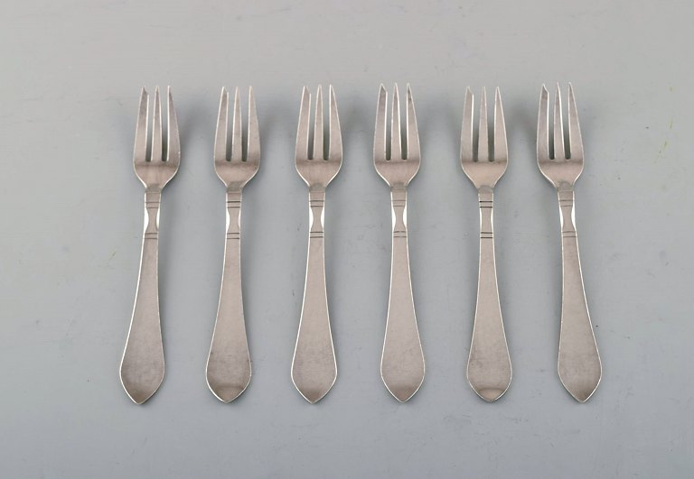 Georg Jensen Continental cutlery. Six cake forks in hammered sterling silver.