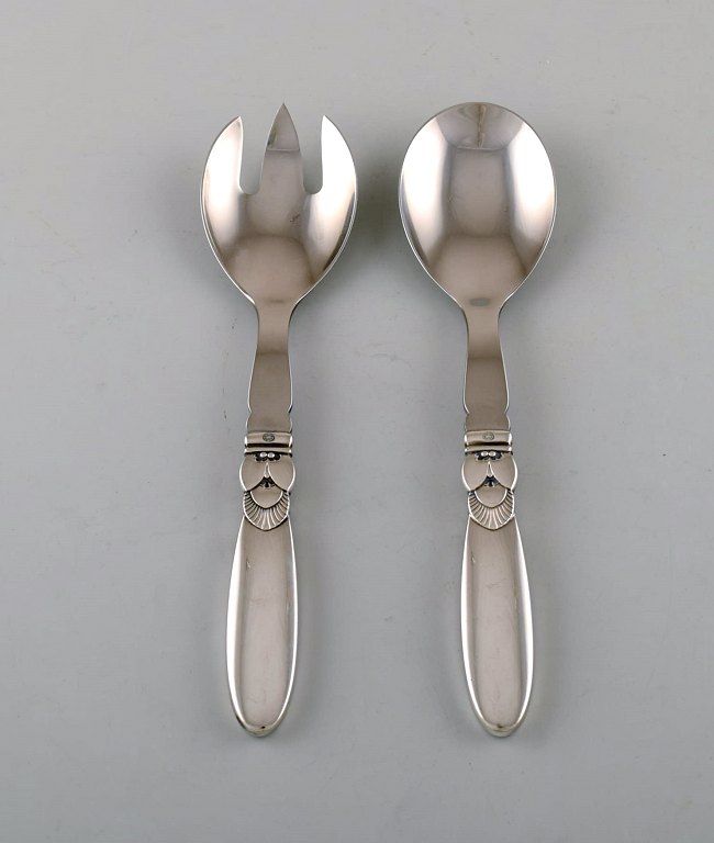 Georg Jensen "Cactus" salad set in sterling silver and stainless steel.