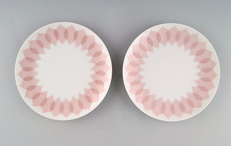 Bjørn Wiinblad for Rosenthal. "Lotus" porcelain service. Two plates decorated with pink lotus leaves. 1980s.