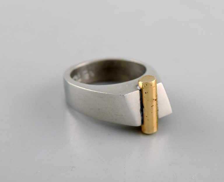 Micke Berggren, Sweden. Modernist designer ring in pewter and brass. Late 20th century.