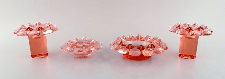 Ann and Göran Wärff for Kosta Boda. Four Krimolin candleholders in pink art glass. 20th century.