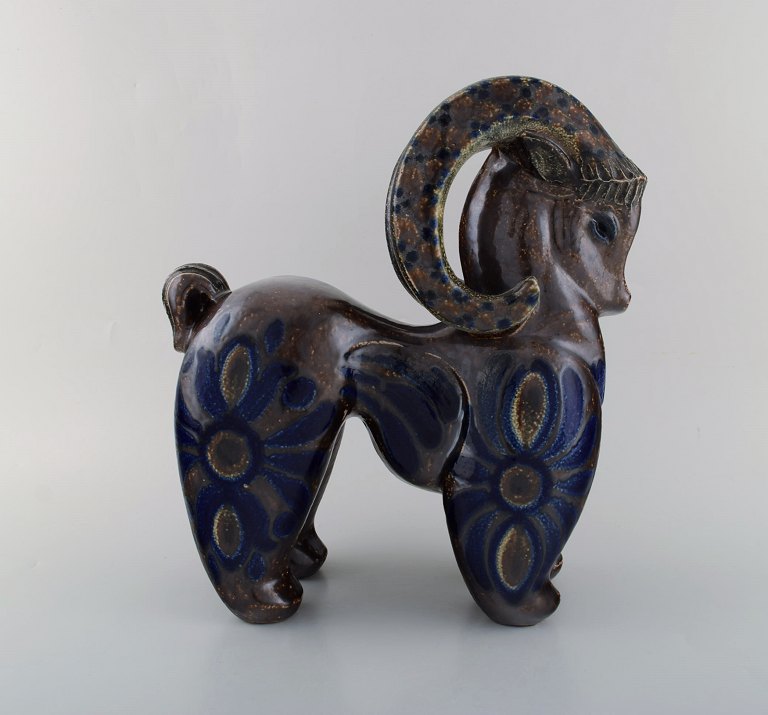 European studio ceramist. Large unique figure in glazed ceramics. Ram. Ca. 1980.