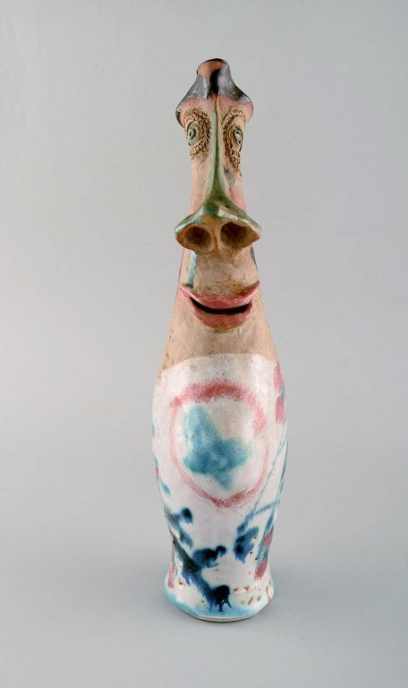 Europæisk studio keramiker. Stor unika kande i glaseret keramik. Grotesque kvindefigur. Ca. 1980.