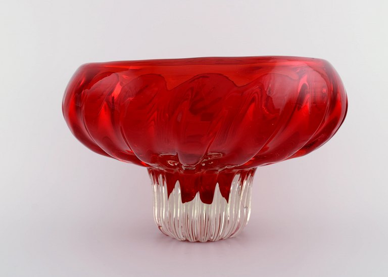 Large Murano bowl on foot in red and clear mouth blown art glass. Italian design, 1960
