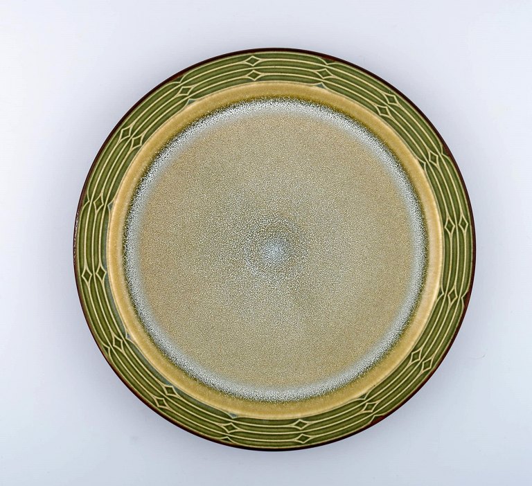 Jens H. Quistgaard (1919-2008) for Bing & Grondahl. Large round "Rune" dish in glazed stoneware. Two pieces in stock.