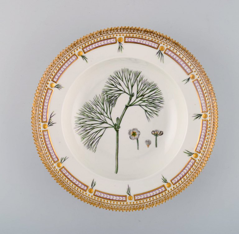 Royal Copenhagen flora danica deep plate in porcelain with hand-painted flowers and gold decoration.