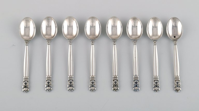 Eight Georg Jensen Acorn coffee spoons in sterling silver.