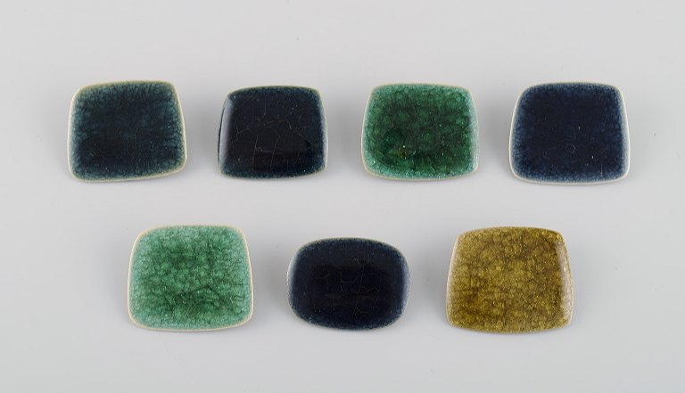 Ole Bjørn Krüger (1922-2007), Danish sculptor and ceramicist. Seven unique brooches in glazed stoneware. 1960s / 70s.