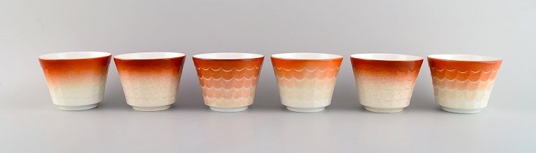 Wilhelm Kåge for Gustavsberg. Six flower pot covers in porcelain. Swedish design, 1960s.