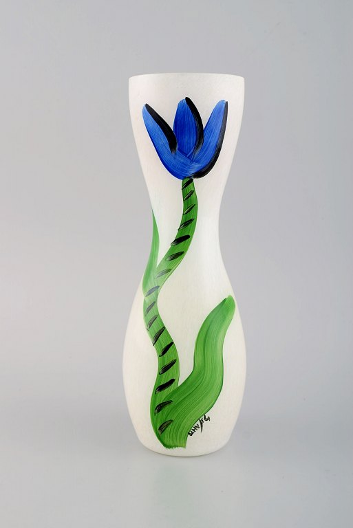 Ulrica Hydman Vallien for Kosta Boda. Vase in mouth-blown art glass with hand-painted flowers. 1980s.