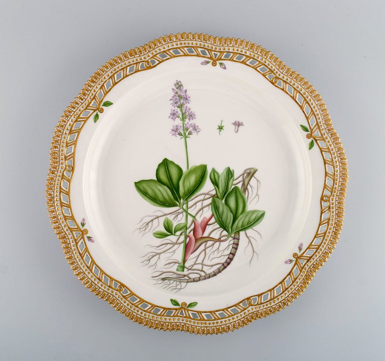Large round Royal Copenhagen Flora Danica serving dish in hand-painted porcelain with flowers and gold decoration. Model number 20/3529. Dated 1963.