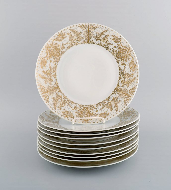 Bjørn Wiinblad for Rosenthal. 10 dinner plates in porcelain with gold decoration. 1980s.