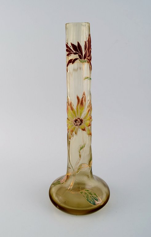 Large antique Emile Gallé Japanism vase in clear frosted art glass. Carved with motifs in the form of flowers and leaves in yellow and red. Museum quality, 1890