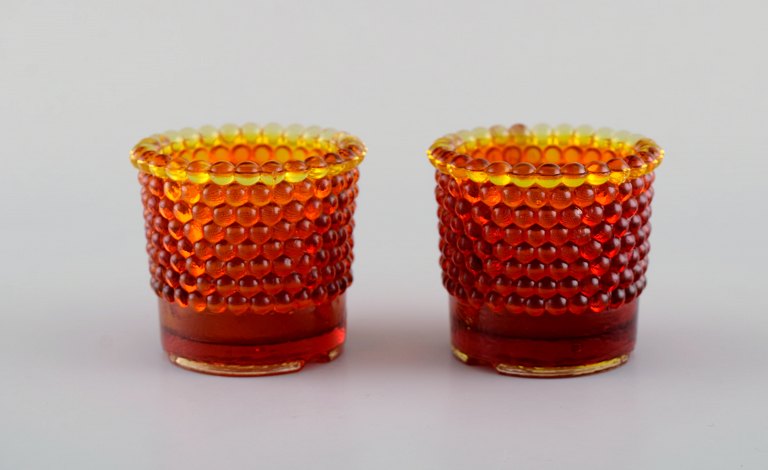 Monica Bratt for Reijmyre. Two Pärlan candlesticks for tealights in mouth-blown art glass. 1950s.