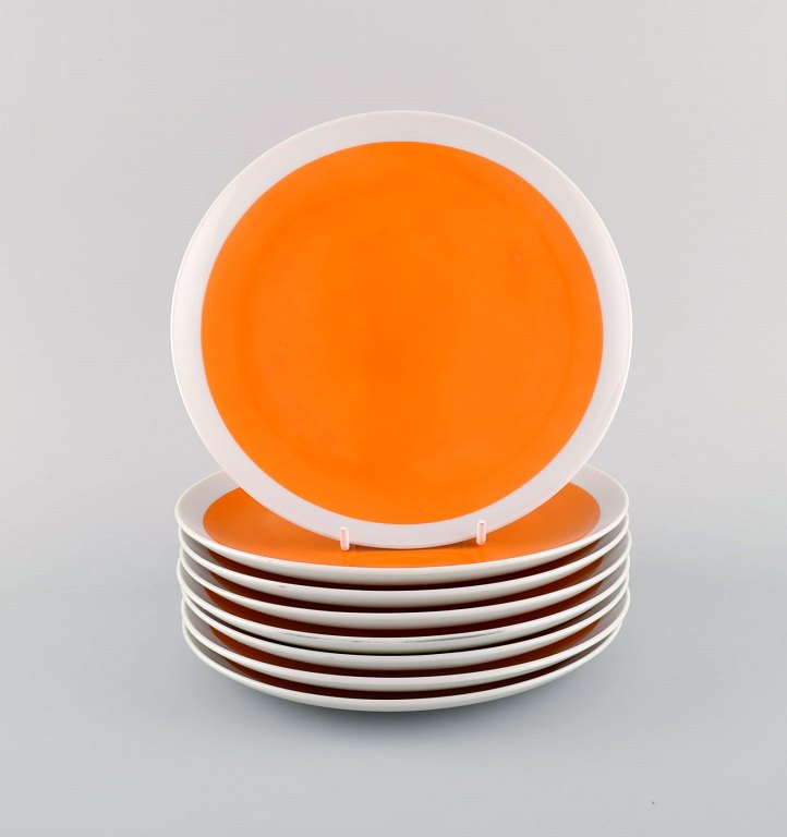 LaGardo Tackett for Schmid. Eight plates in porcelain. Beautiful orange glaze. Dated 1953-56.