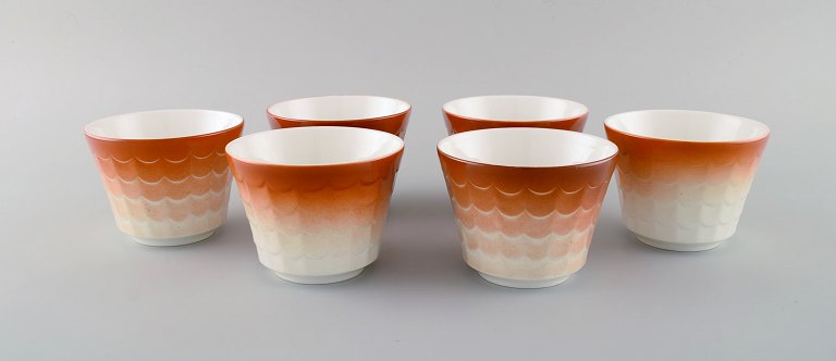 Wilhelm Kåge for Gustavsberg. Six flower pot covers in porcelain. Swedish design, 1960s.