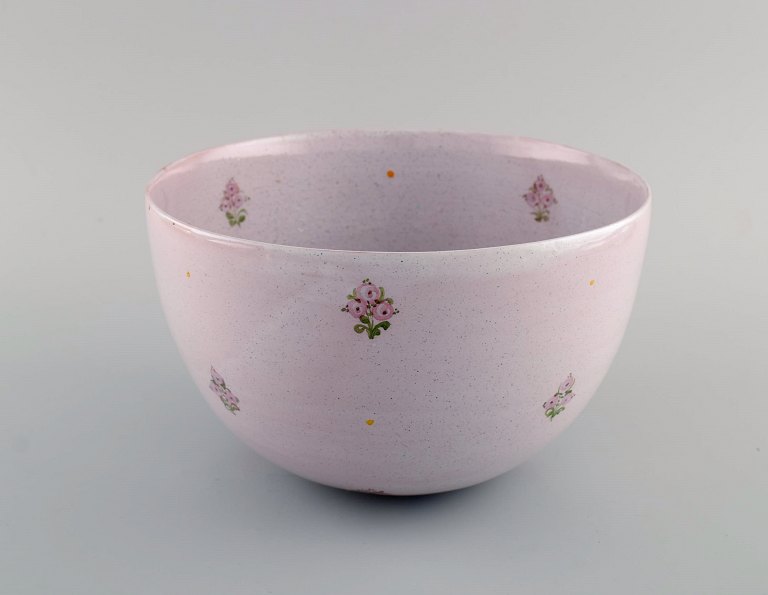 Bjørn Wiinblad (1918-2006). Early and rare unique bowl in glazed ceramics with hand-painted flowers and motif of young woman. Dated 1944 and 1954.
